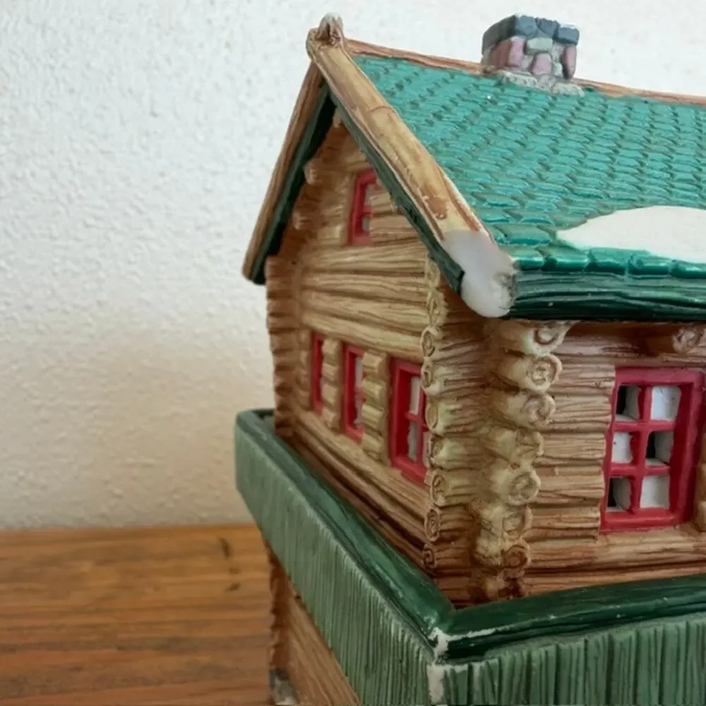 Seasonal Specialties Outfitters Shop and Christmas Village Log Cabin